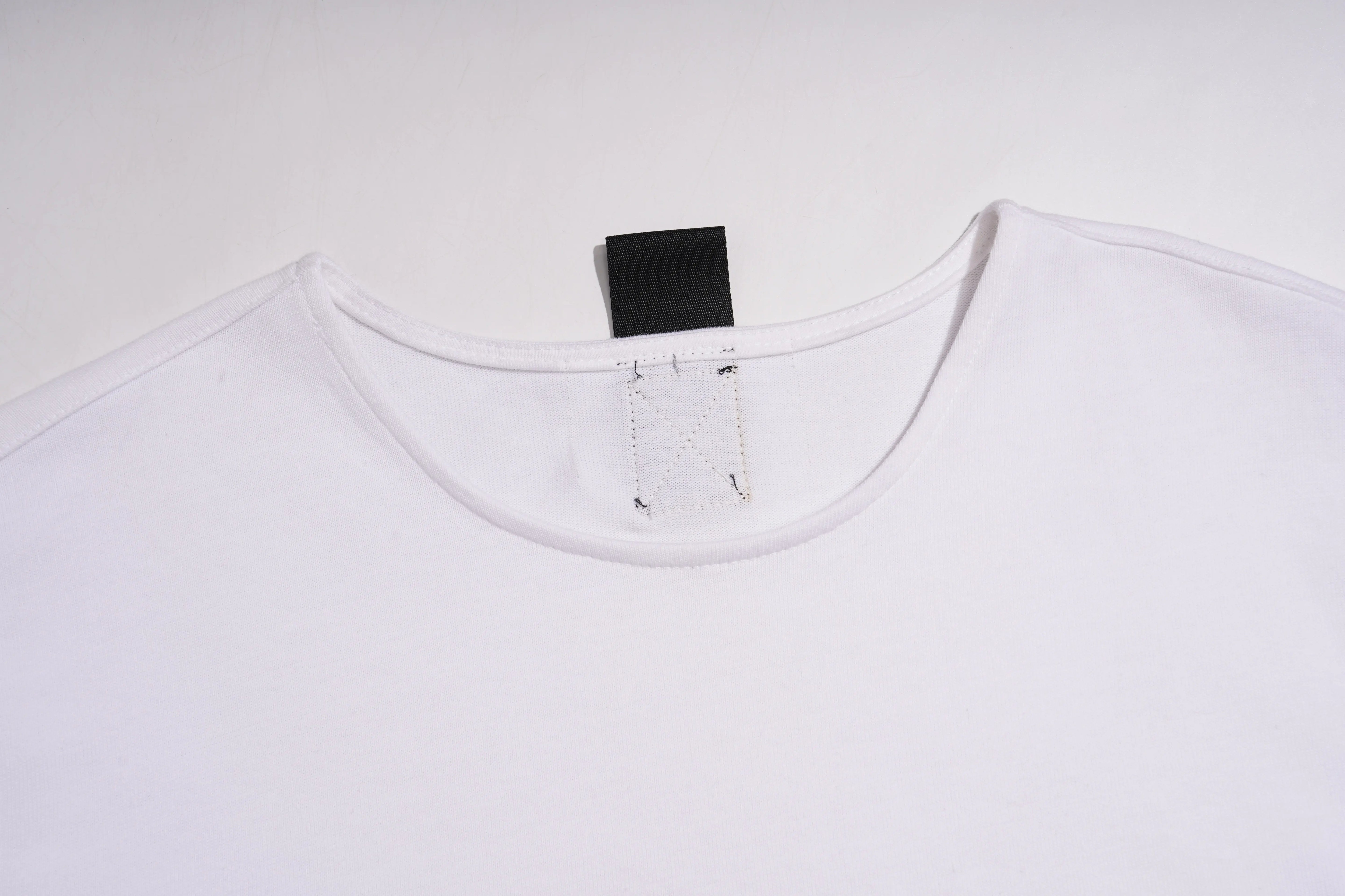 White t-shirt with a black tag on a white background, TCH TECHNO Rhinestone Layered Typography T-Shirt