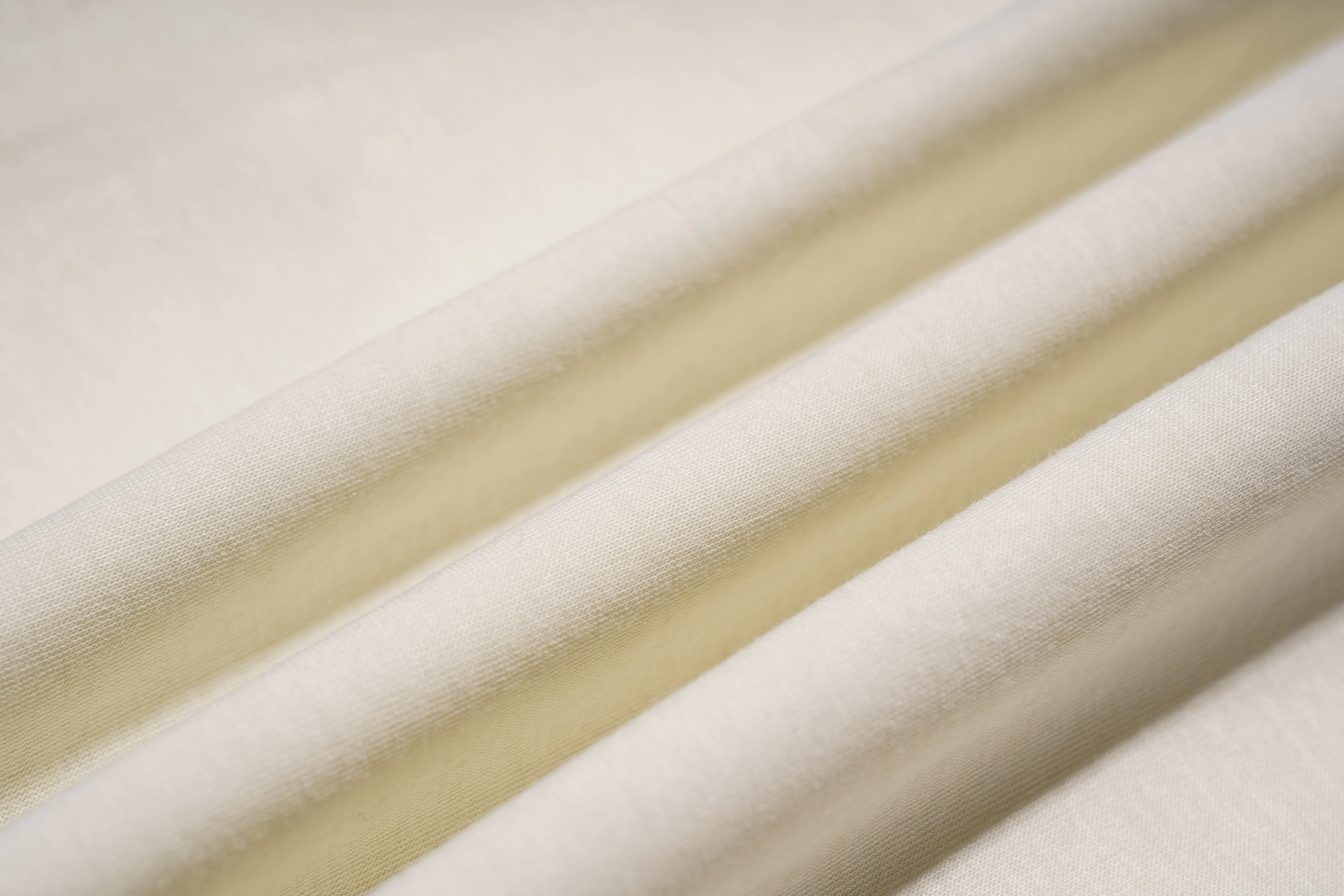 Close-up of beige fabric with a soft texture, TCH Teddy Bear Garden Rhinestone Lounge Set