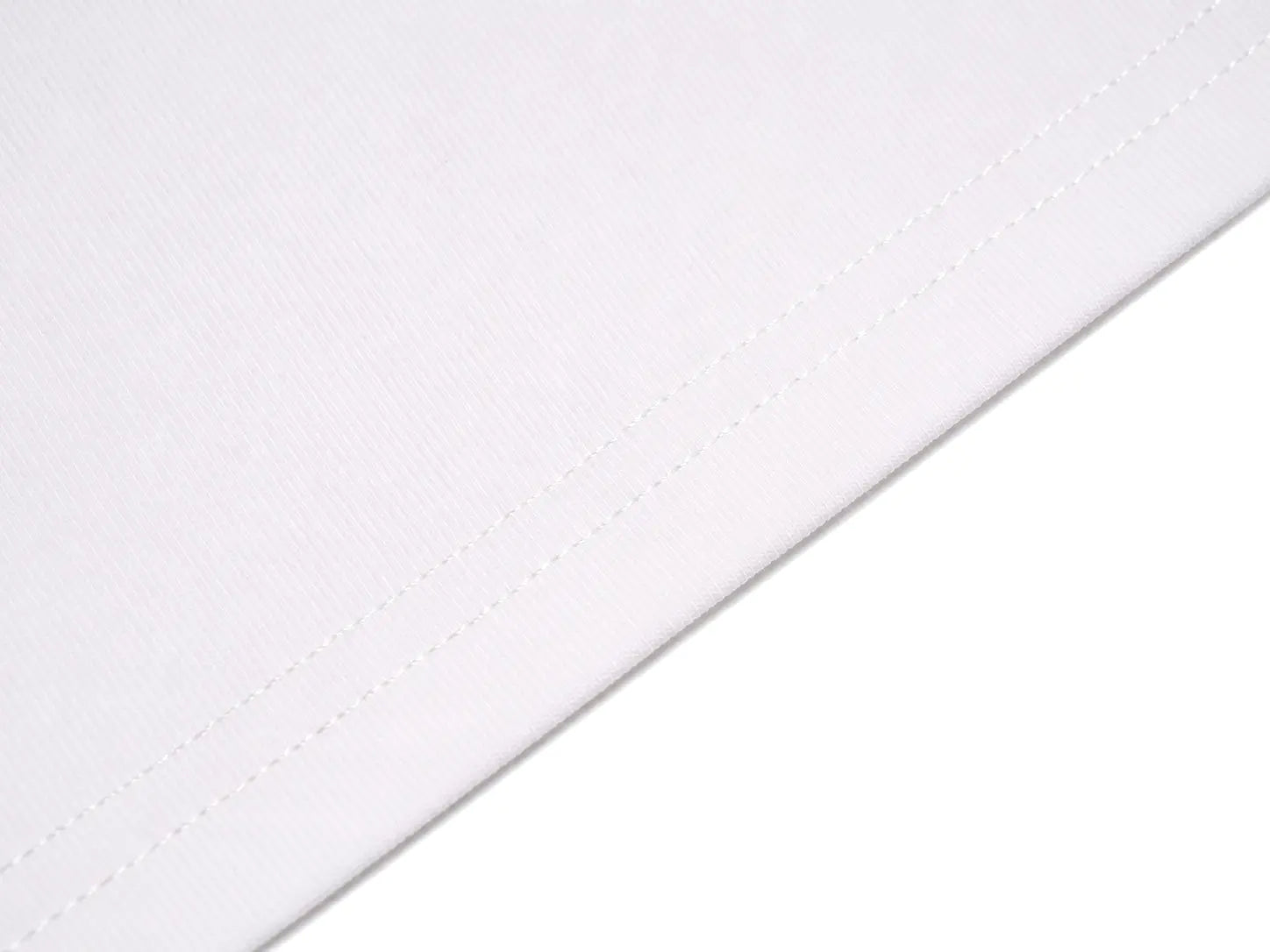 Close-up of a white fabric surface with a diagonal stitched seam on a white background. TCH Teddy Bear Rhinestone All-Over Graphic T-Shirt