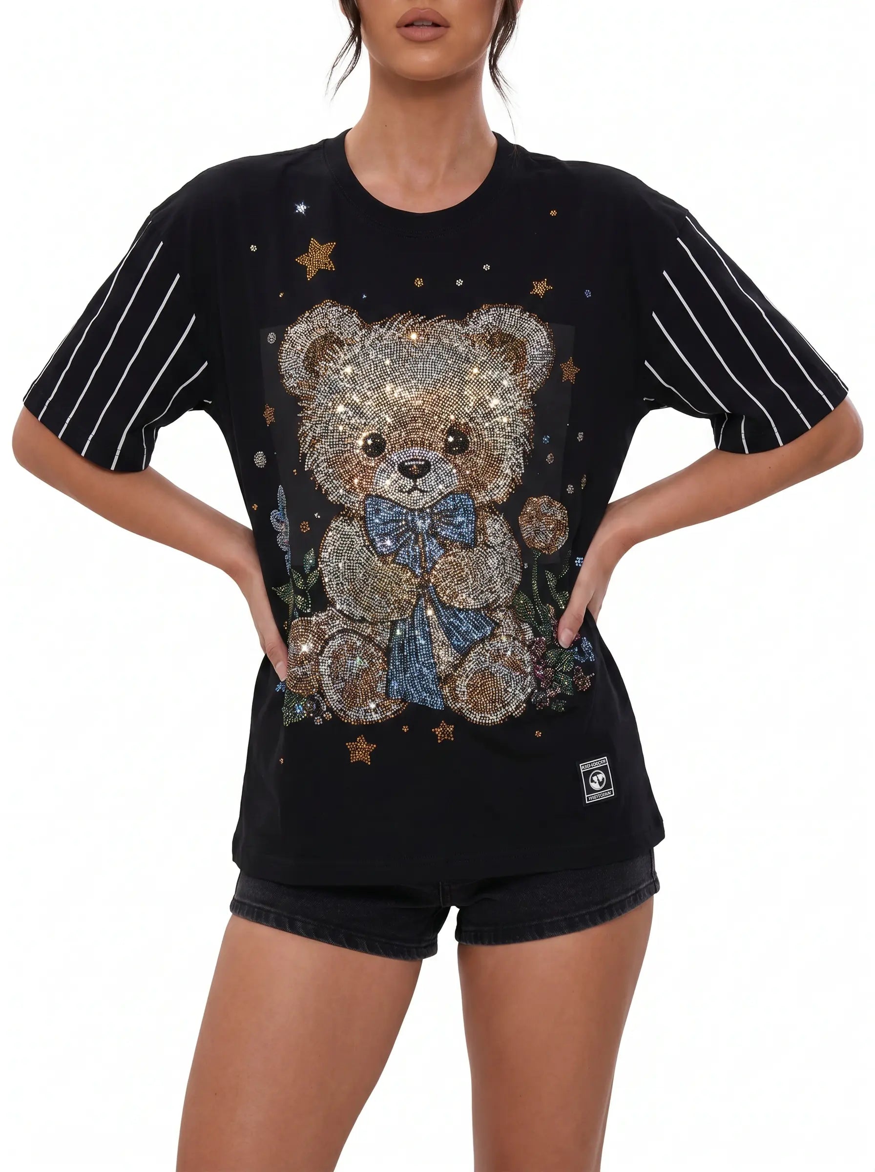 Black t-shirt with teddy bear design worn by a person on a white background, TCH Teddy Bear & Stars Rhinestone T-Shirt