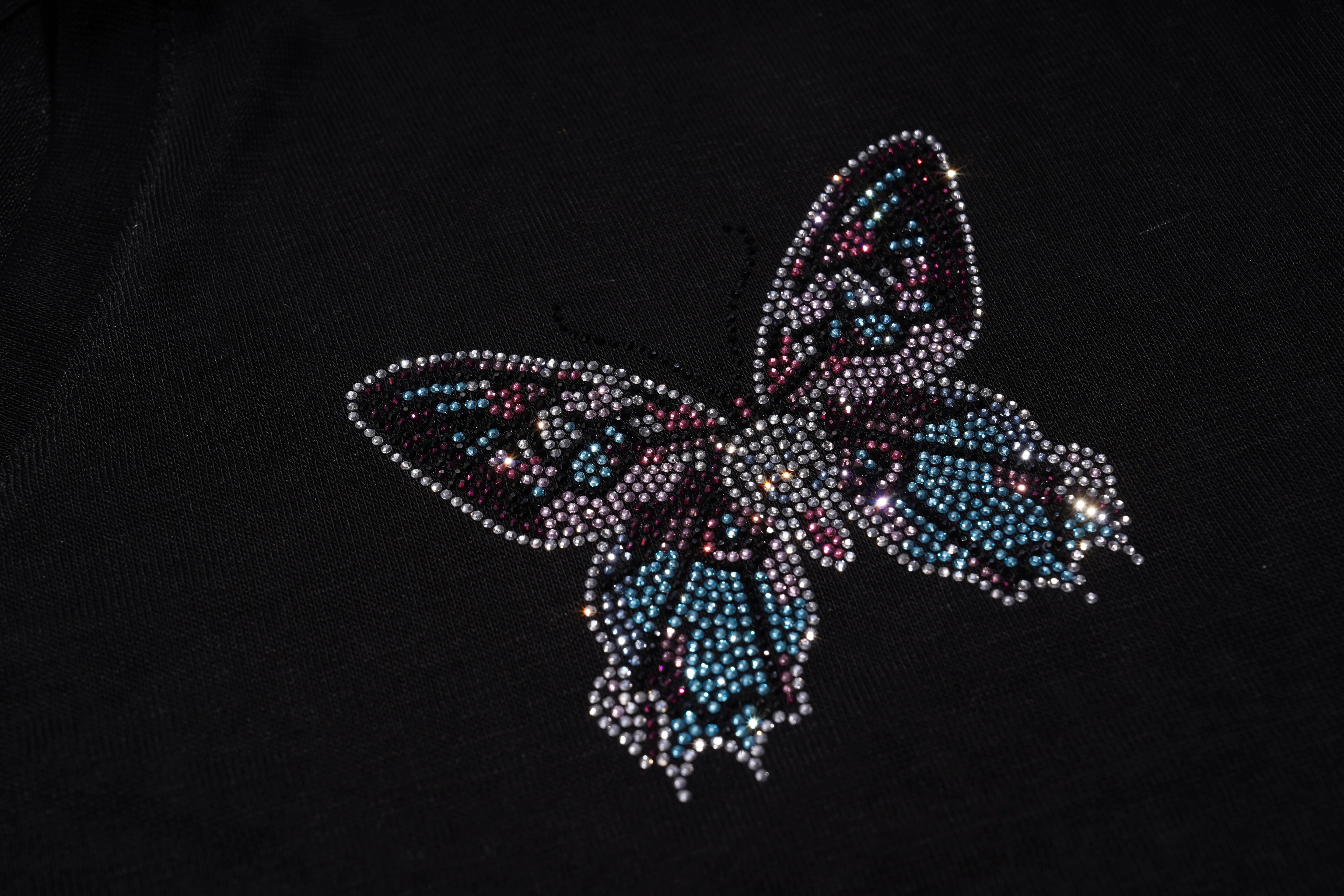 Butterfly-shaped decorative item with multicolored rhinestones on a black background, TCH V-Neck Rhinestone Butterfly Long Sleeve Top