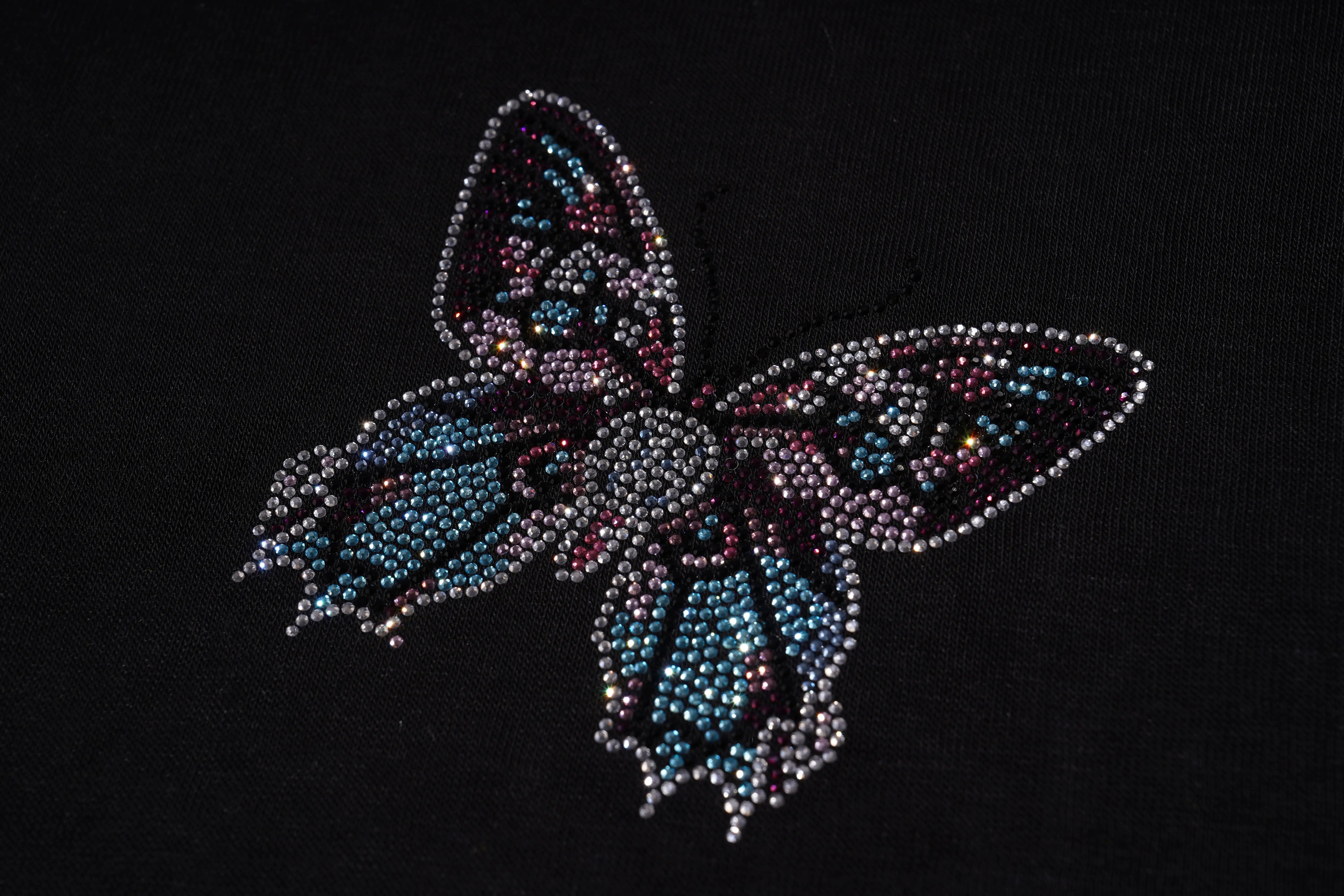 Butterfly design made of colorful rhinestones on a black background, TCH V-Neck Rhinestone Butterfly Long Sleeve Top