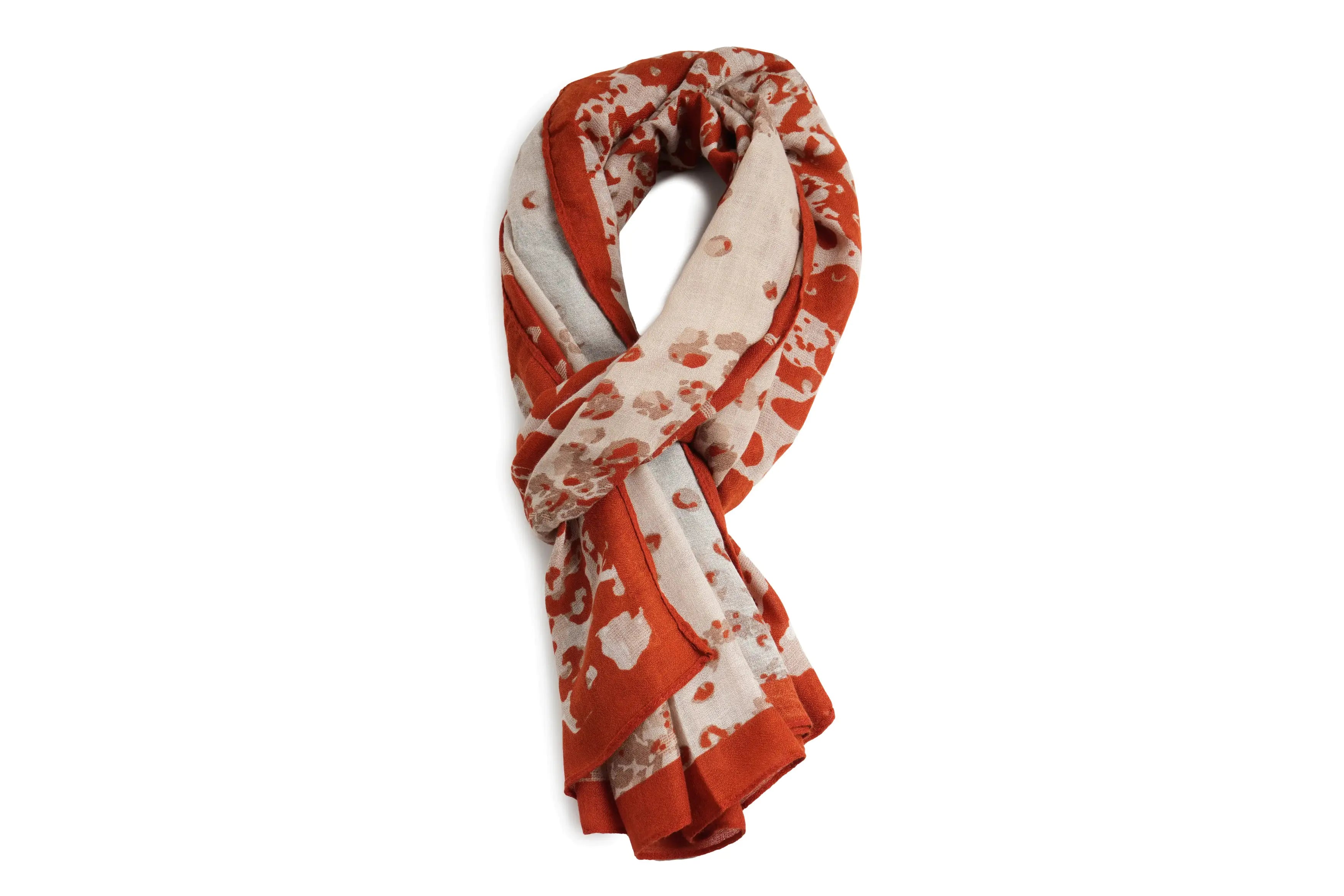A lightweight scarf with a rust orange and cream abstract floral pattern, styled in a loop on a solid white background. TCH Vintage Leopard Print Lightweight Fashion Scarf