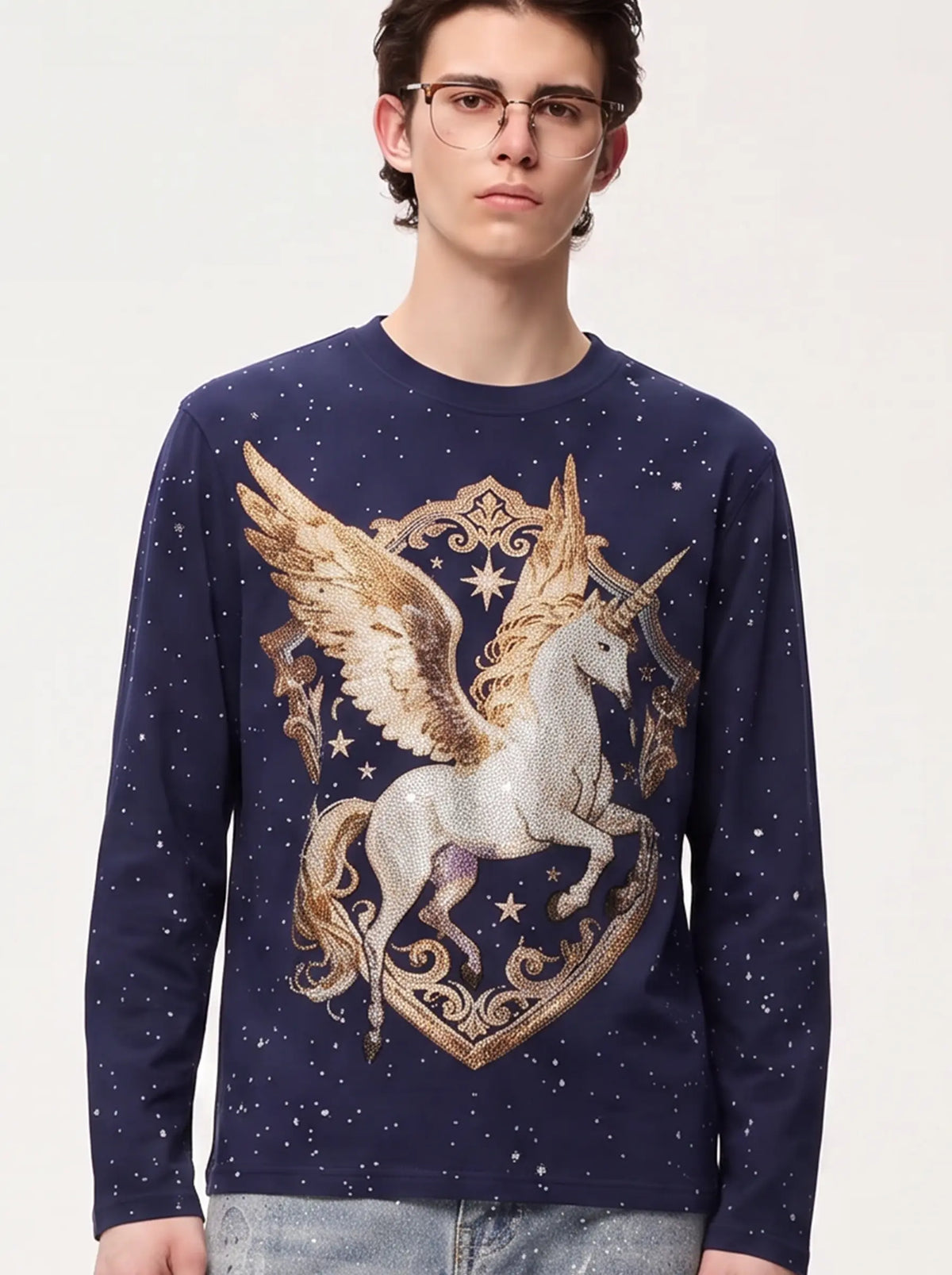 A model wearing a light blue denim jacket with various embroidered patches, including a teddy bear on the left chest and cherries on the sleeve, styled over a white t-shirt and dark pants. TCH Winged Unicorn Starry Rhinestone Long Sleeve T-Shirt