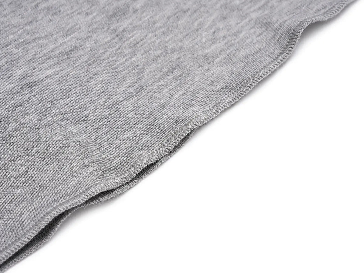 Close-up of a heather gray knit fabric with a fine ribbed edge, shown against a plain white background. TCH Women's Striped Polo Mini Dress