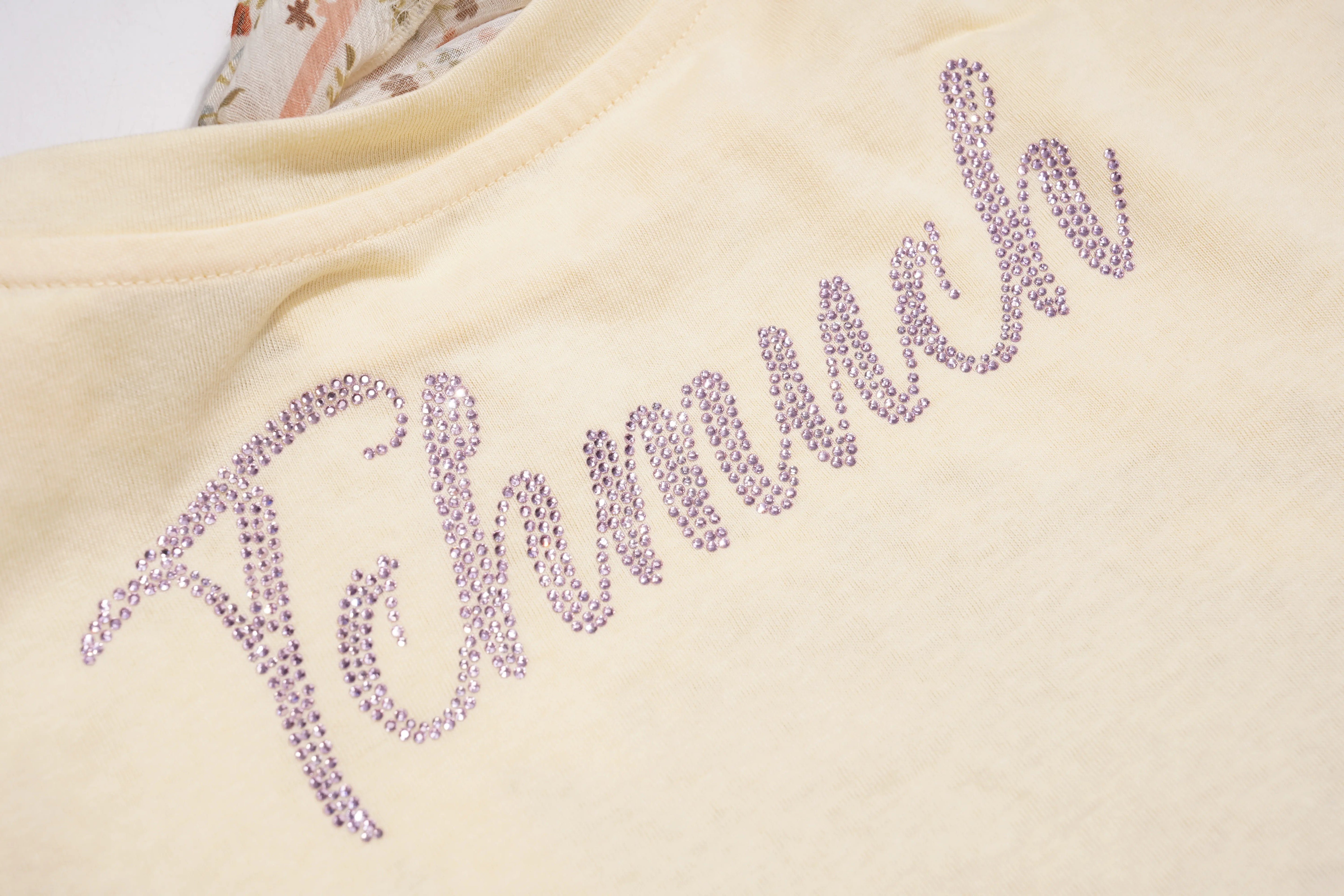 Beige fabric with 'Felicidade' embroidered in purple thread, TCH Yellow Rhinestone Realistic Unicorn Graphic Bow Detail T-Shirt